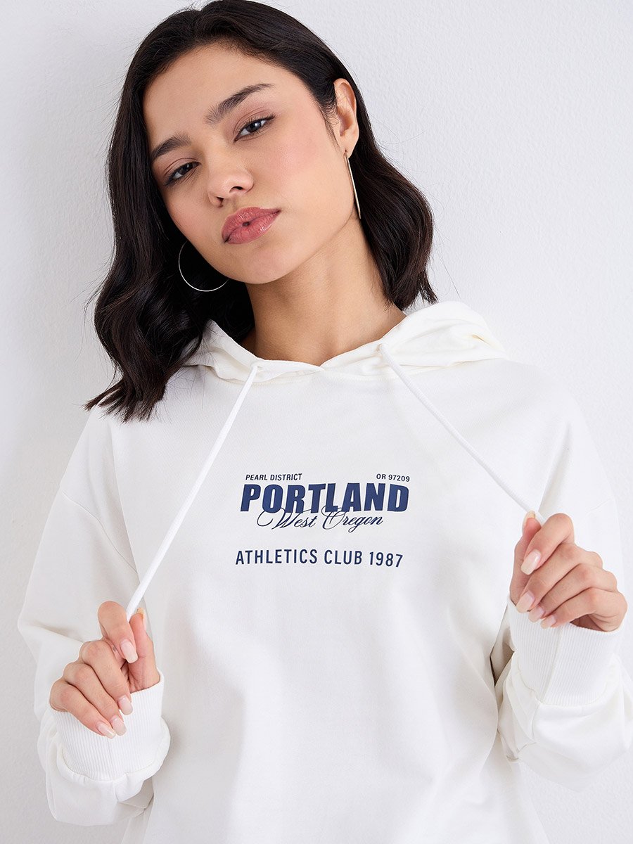 Off White Longline Hoodie with Slogan Print