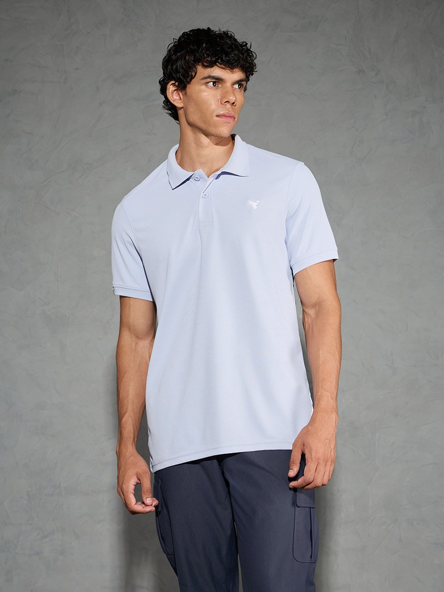 Men Light Blue Solid Slim Fit Polo