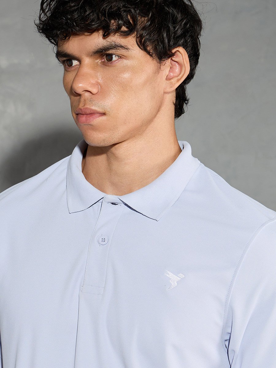 Men Light Blue Solid Slim Fit Polo