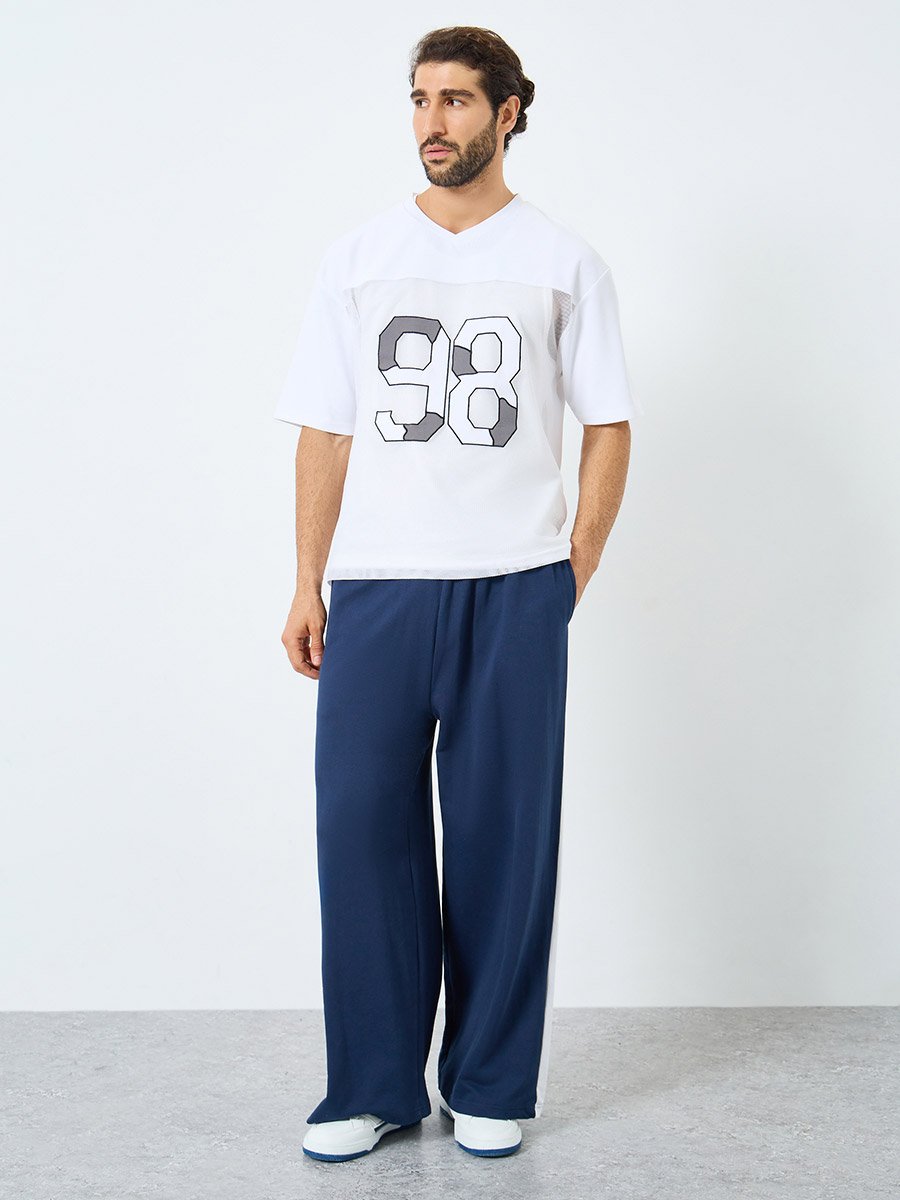 Oversized Cut and Sew Panel Mesh T-Shirt