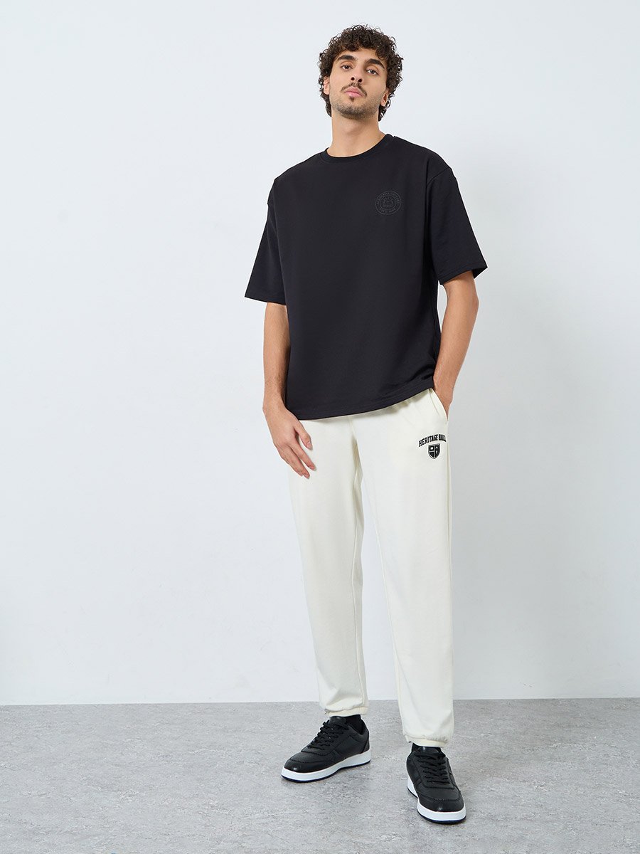 Men Cream Pocket Print Terry Joggers