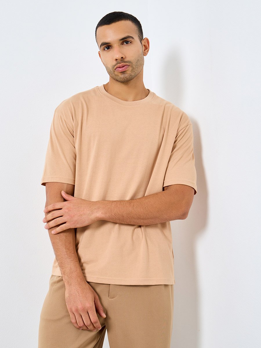 Men Beige Text Printed Oversized Jersey T-Shirt