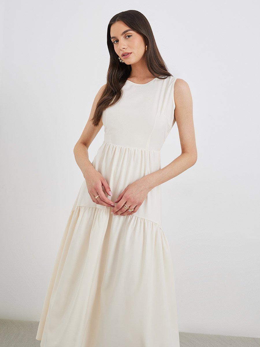 Beige Solid Sleeveless Tiered Midi Dress For Women at Bahrain | Styli