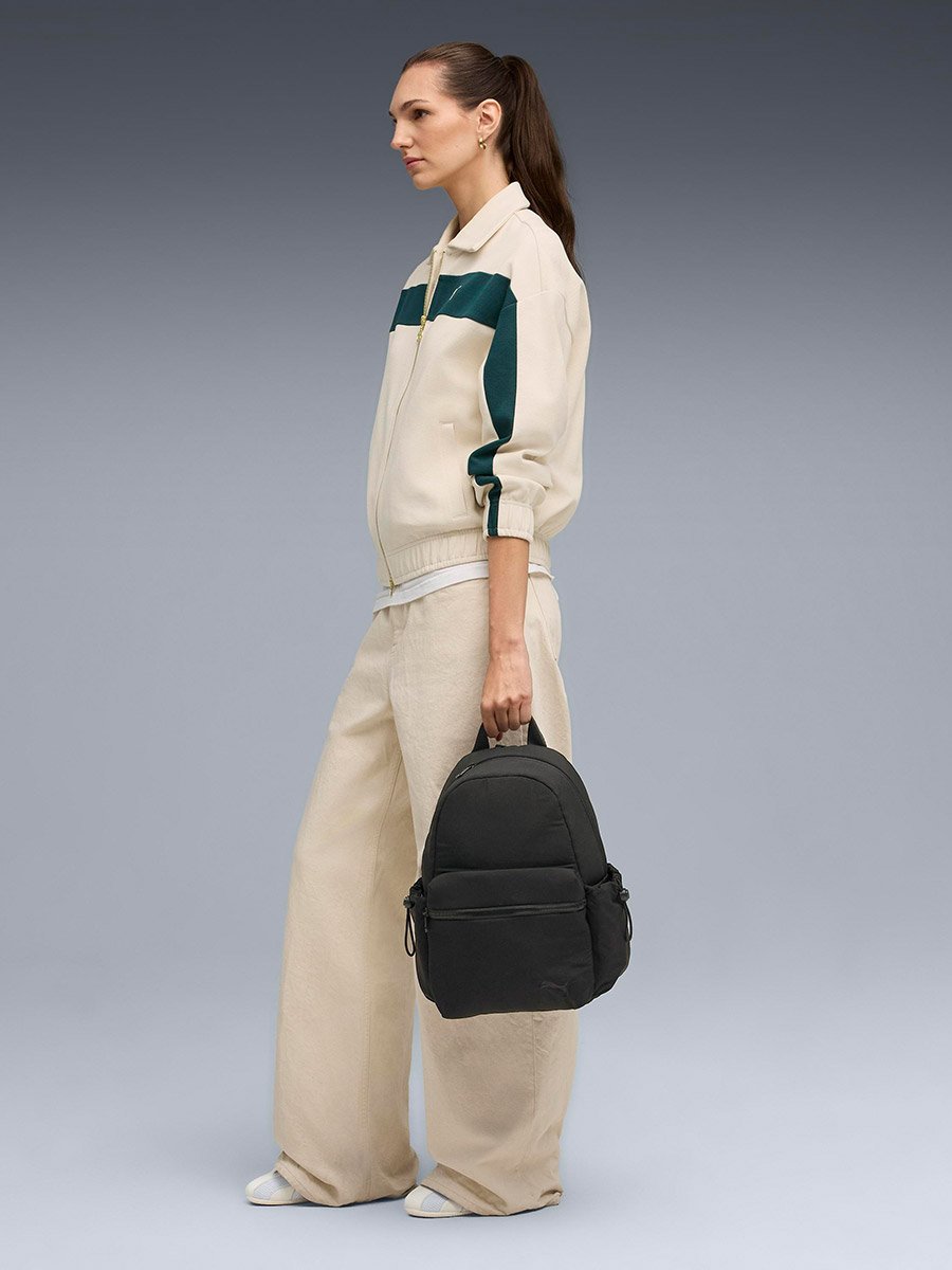 Her Small Backpack