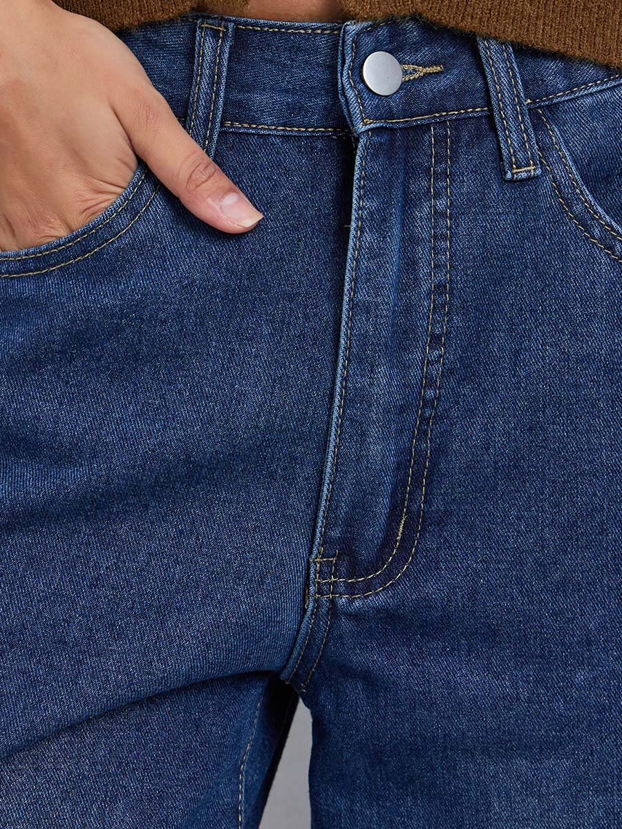 جينز بأرجل واسعة وخصر عالي