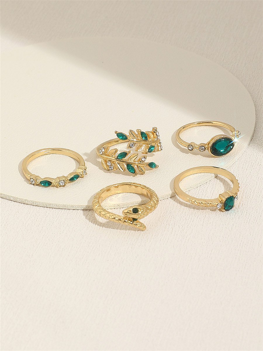 Set of 5 - Gold Tone Rings with Green Accent