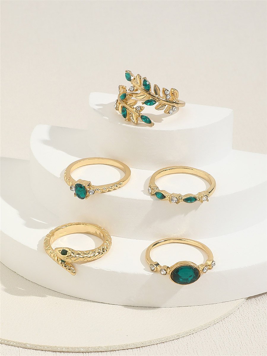Set of 5 - Gold Tone Rings with Green Accent