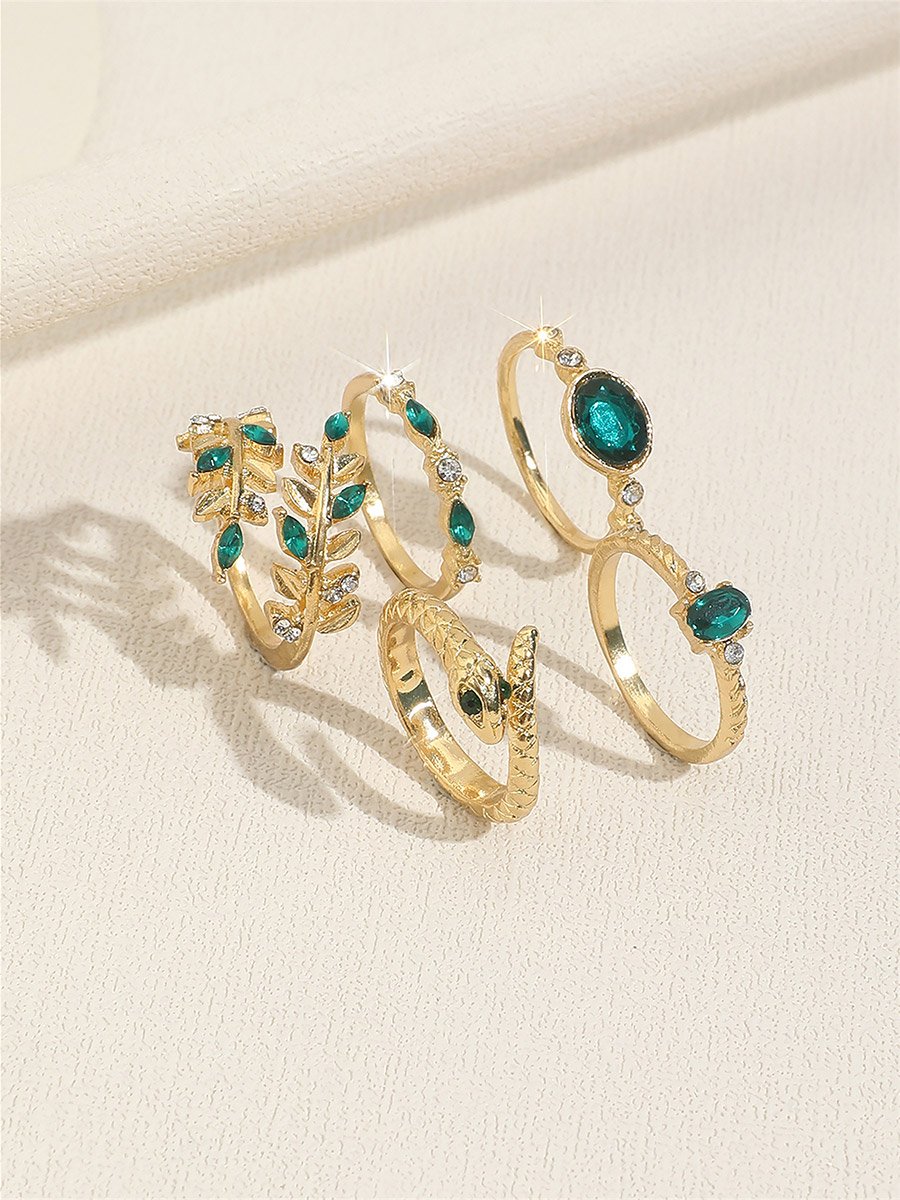 Set of 5 - Gold Tone Rings with Green Accent