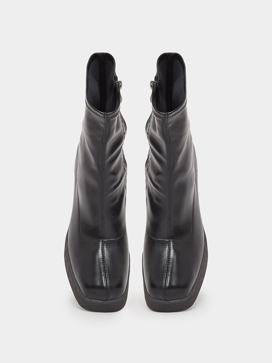 حذاء بوت كعب بلاتفورم بطول منتصف ربلة الساق