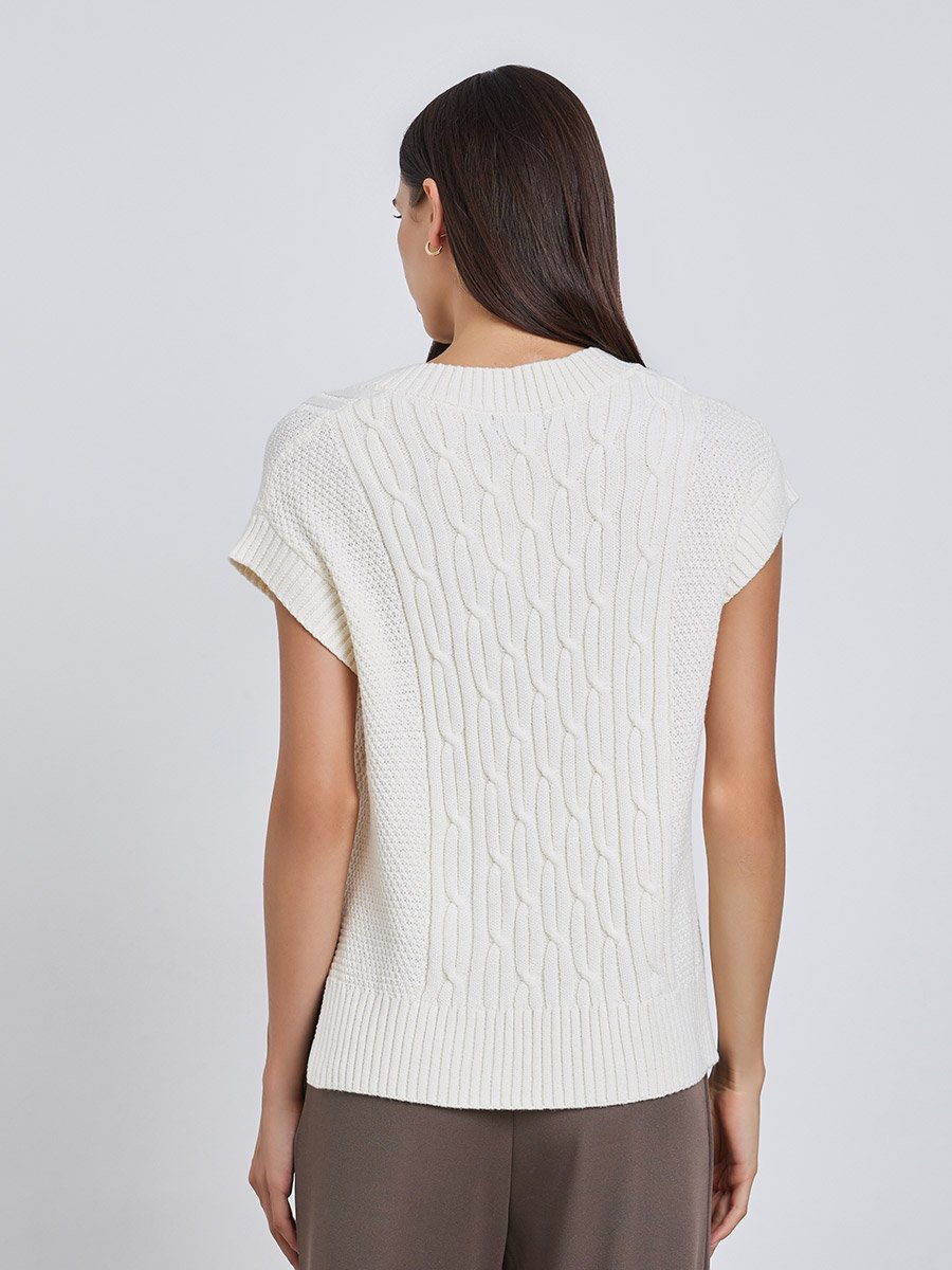 White Cable Knit Sleeveless Sweater For Women at Saudi | Styli