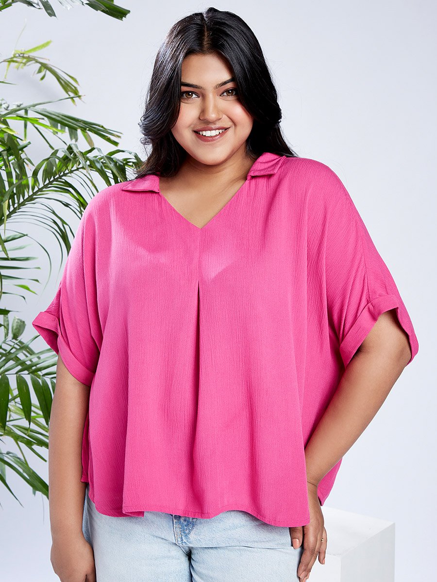 بلوزة بمقاس كبير وأكمام قصيرة