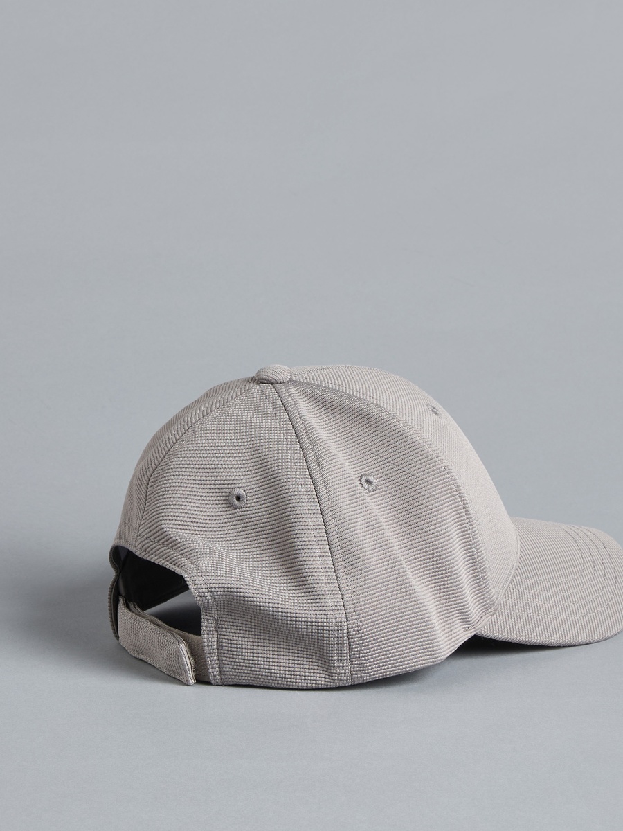 Textured Cap with Hook and Loop Strap Closure
