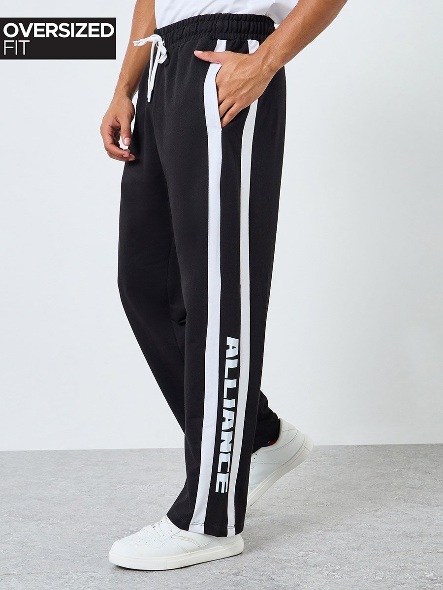 Men Oversized Terry Side Tape Printed Joggers