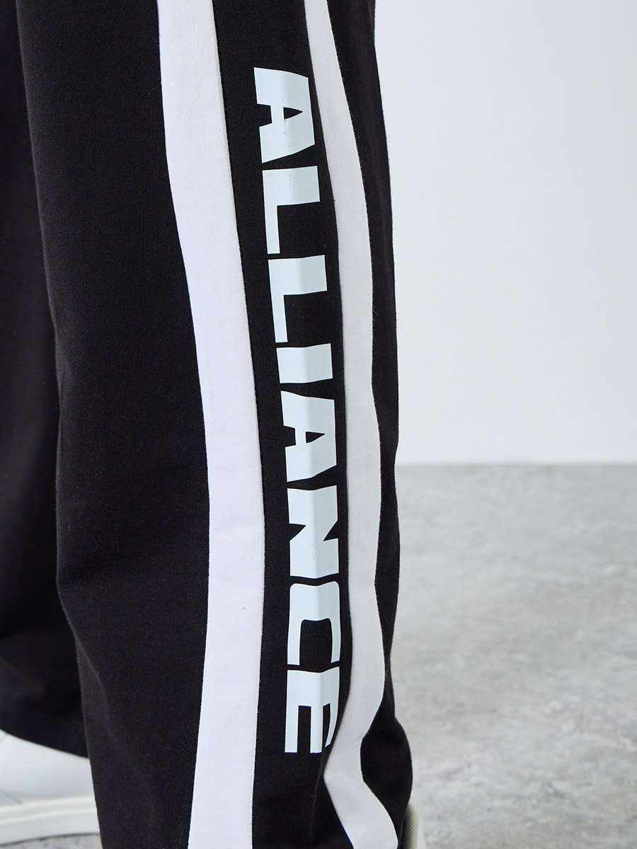 Men Oversized Terry Side Tape Printed Joggers