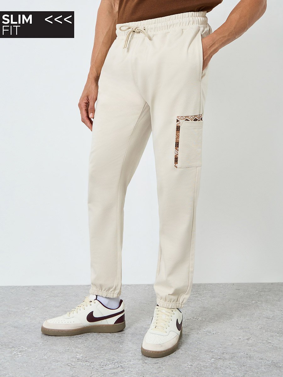 Men Beige Slim Fit Joggers with Pocket Detail