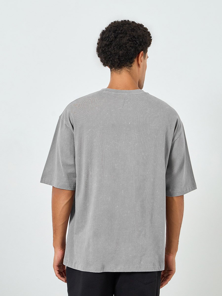 Men Grey Graphic Print Oversized T-Shirt For Men at UAE | Styli