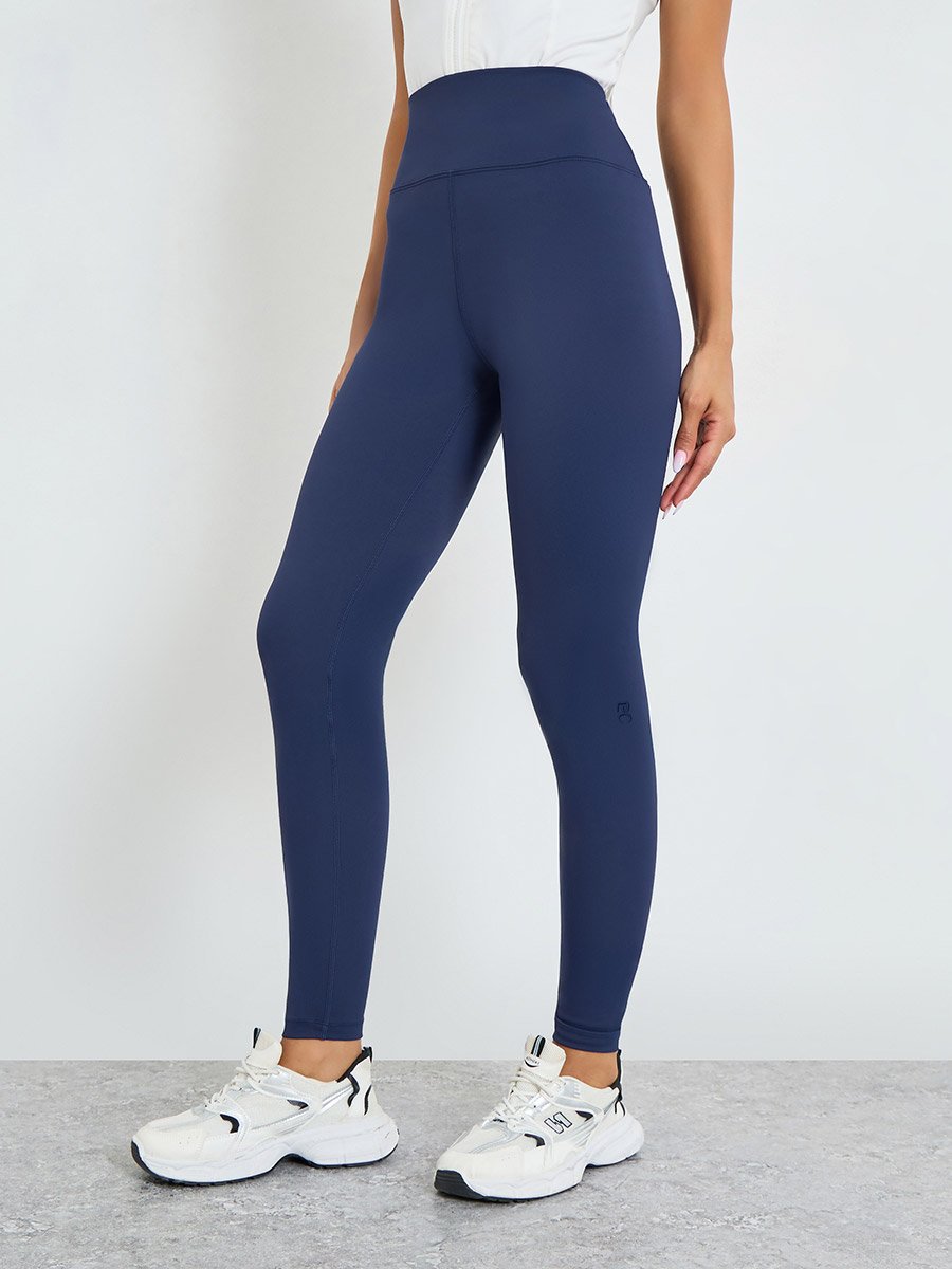 Women Knee Rubber Logo Side Pocket Leggings