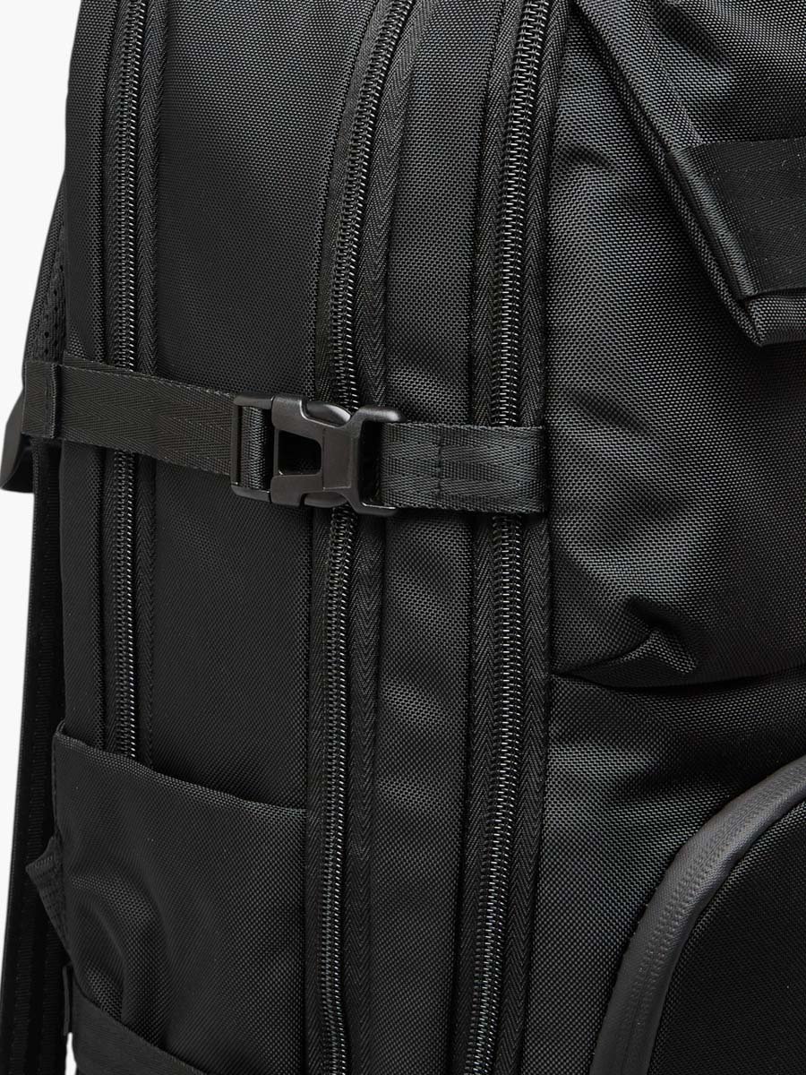 Solid Backpack with Adjustable Straps and Zip Closure