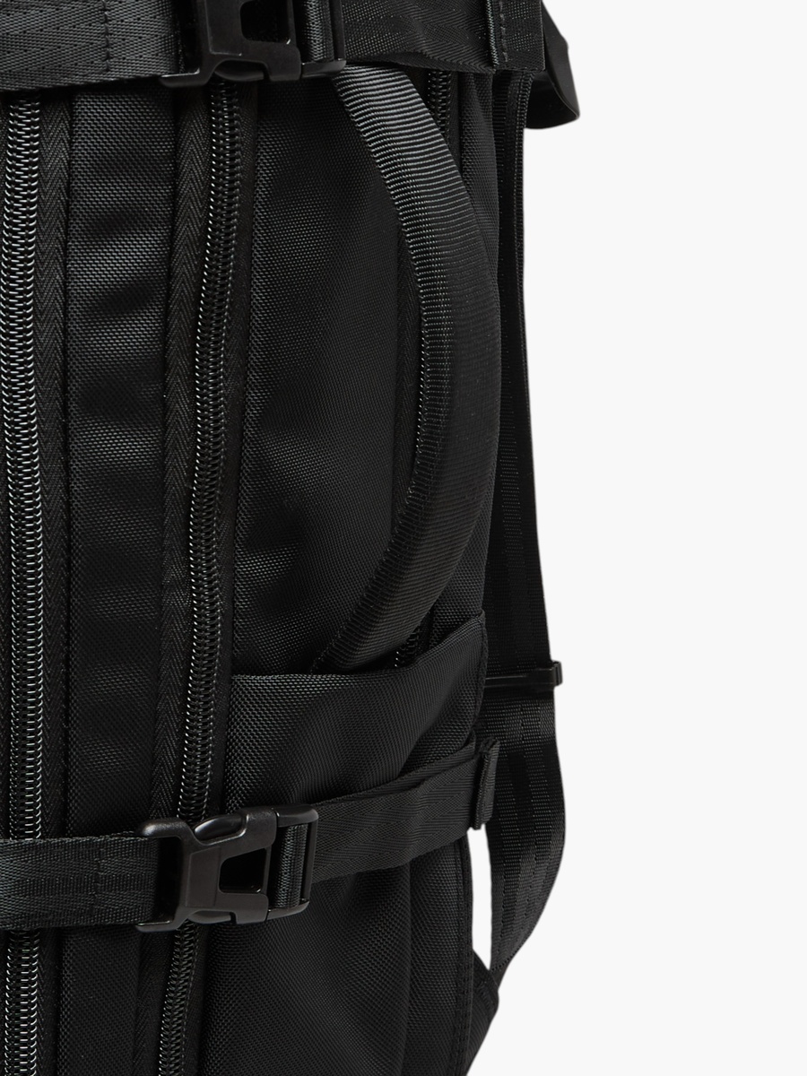 Solid Backpack with Adjustable Straps and Zip Closure