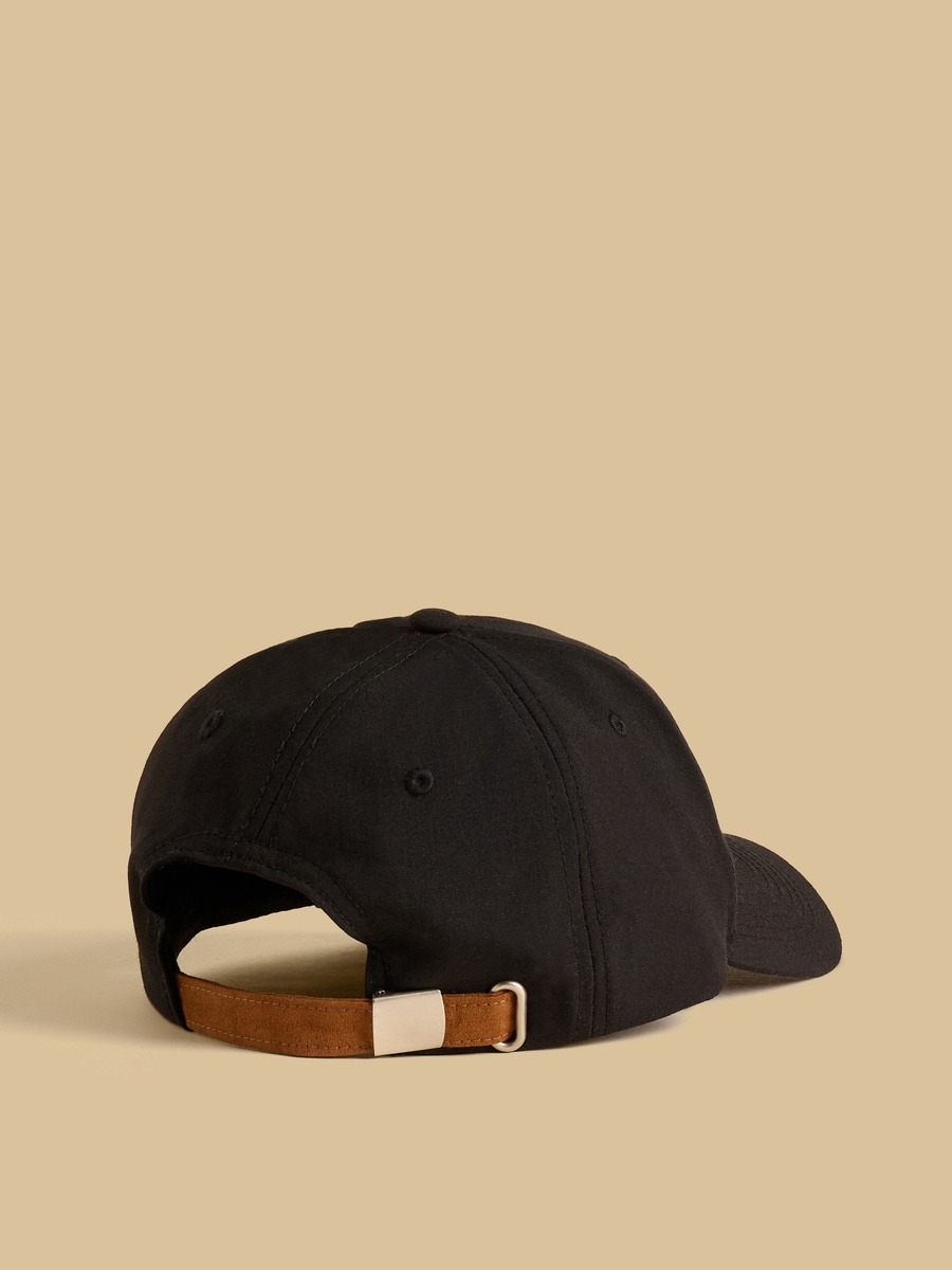 Eyelet Accent Cap with Buckled Strap Closure