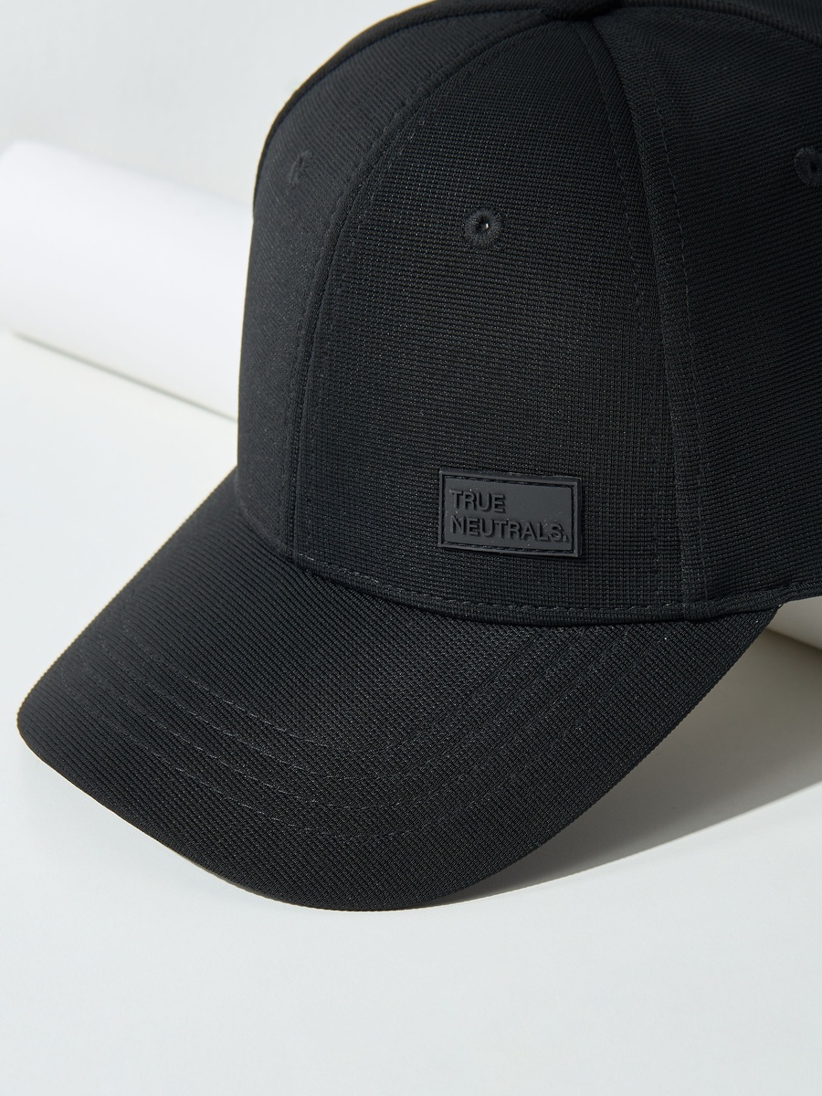 Textured Cap with Snap Button Closure