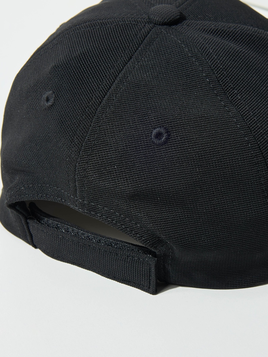 Textured Cap with Snap Button Closure