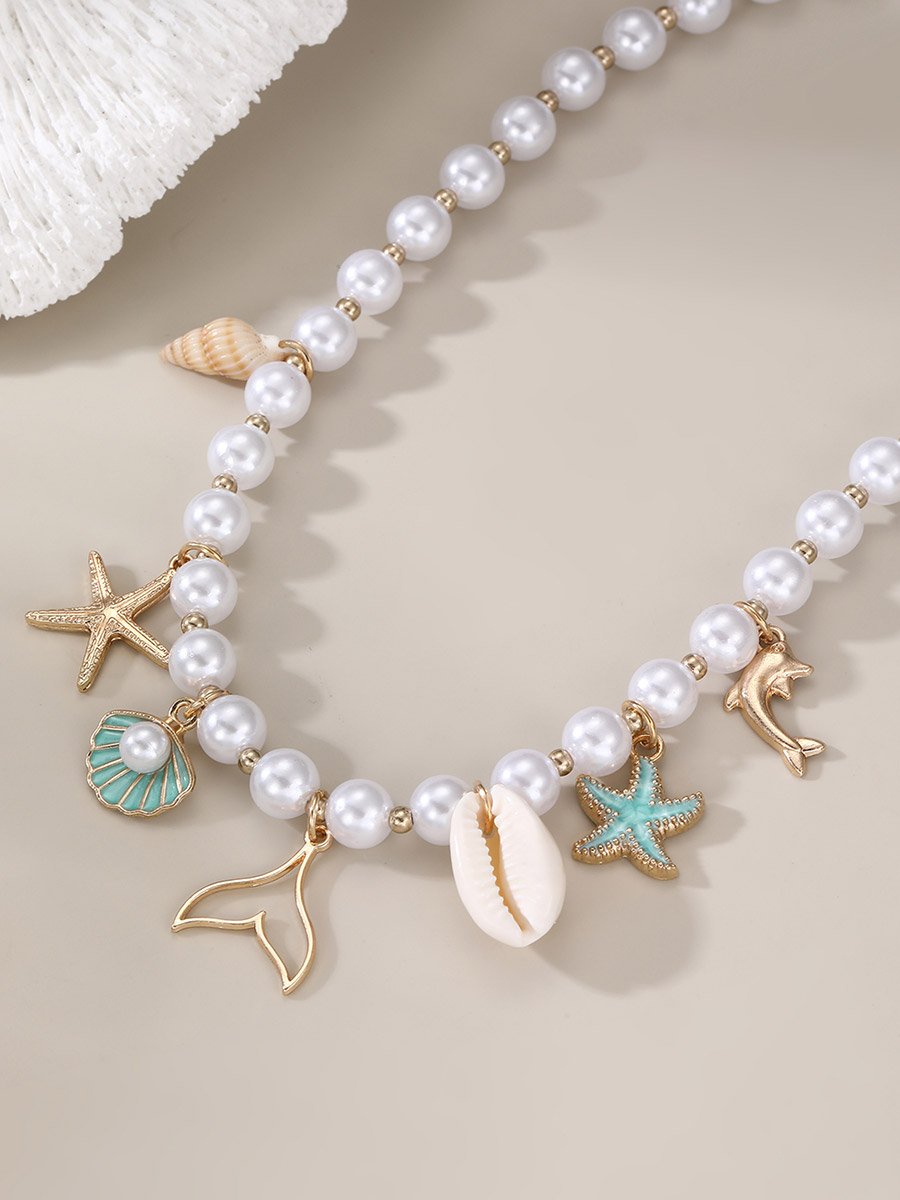 White Pearl Beaded Necklace with Sea Charms