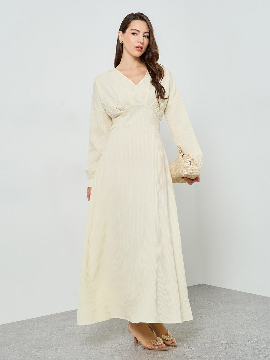 Beige Textured V Neck Maxi Dress For Default Category at UAE | Styli Beige Textured V Neck Maxi Dress For Default Category at UAE | Styli