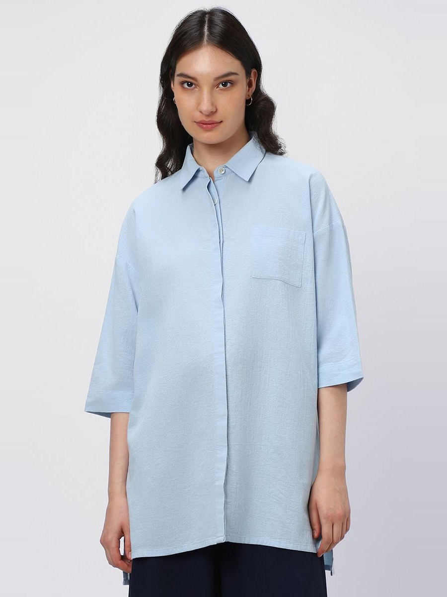 بلوزة بخامة منقوشة