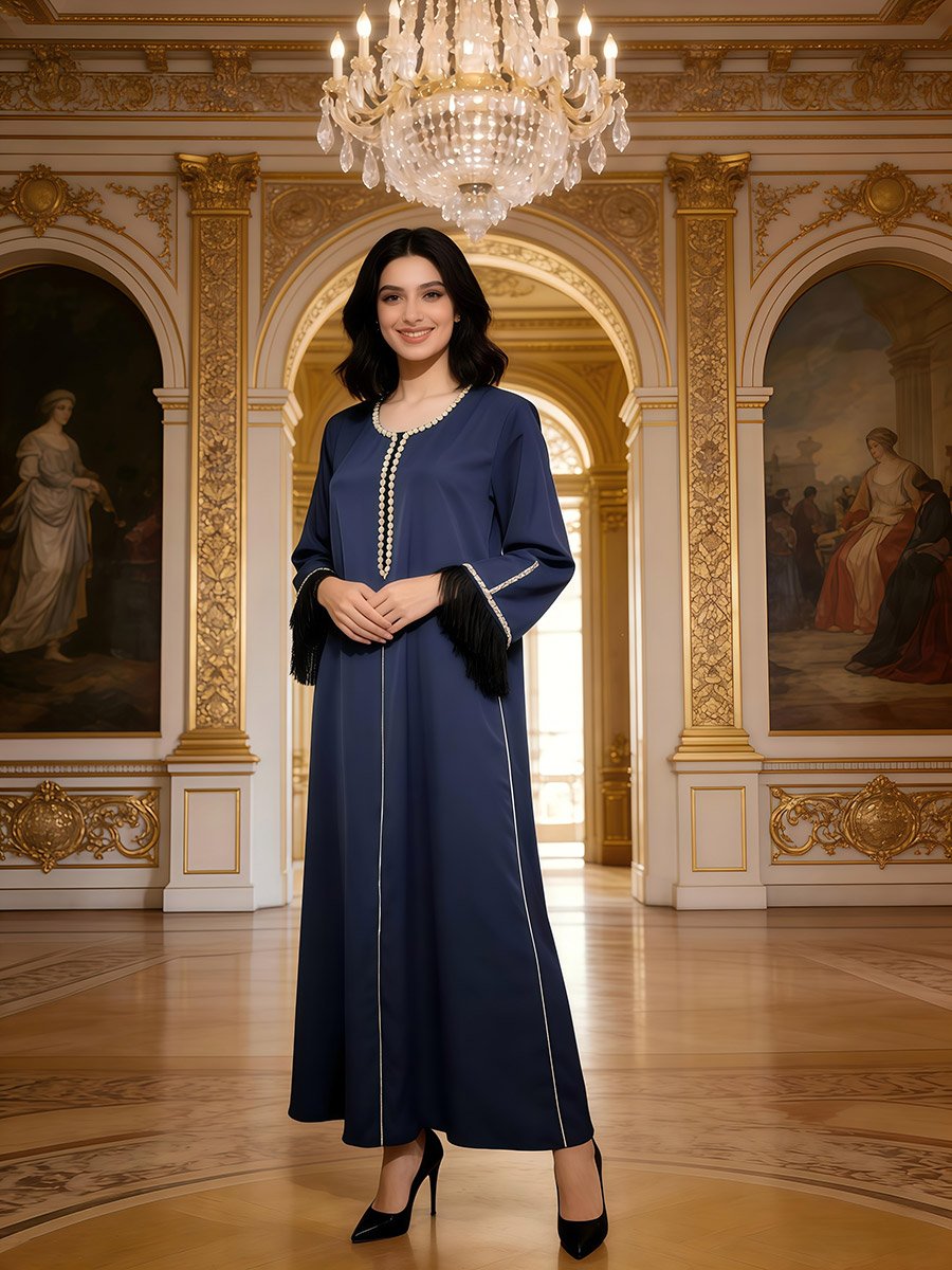 جلابية نسائية مطرزة بحافة واسعة بلون كحلي
