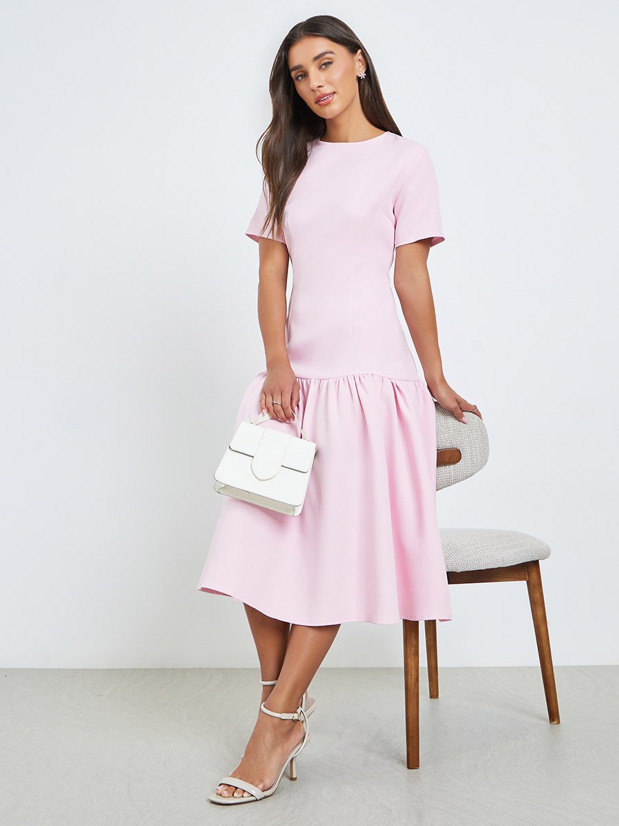 Pink Solid Drop Waist Short Sleeves Midi Dress For Women at Kuwait | Styli