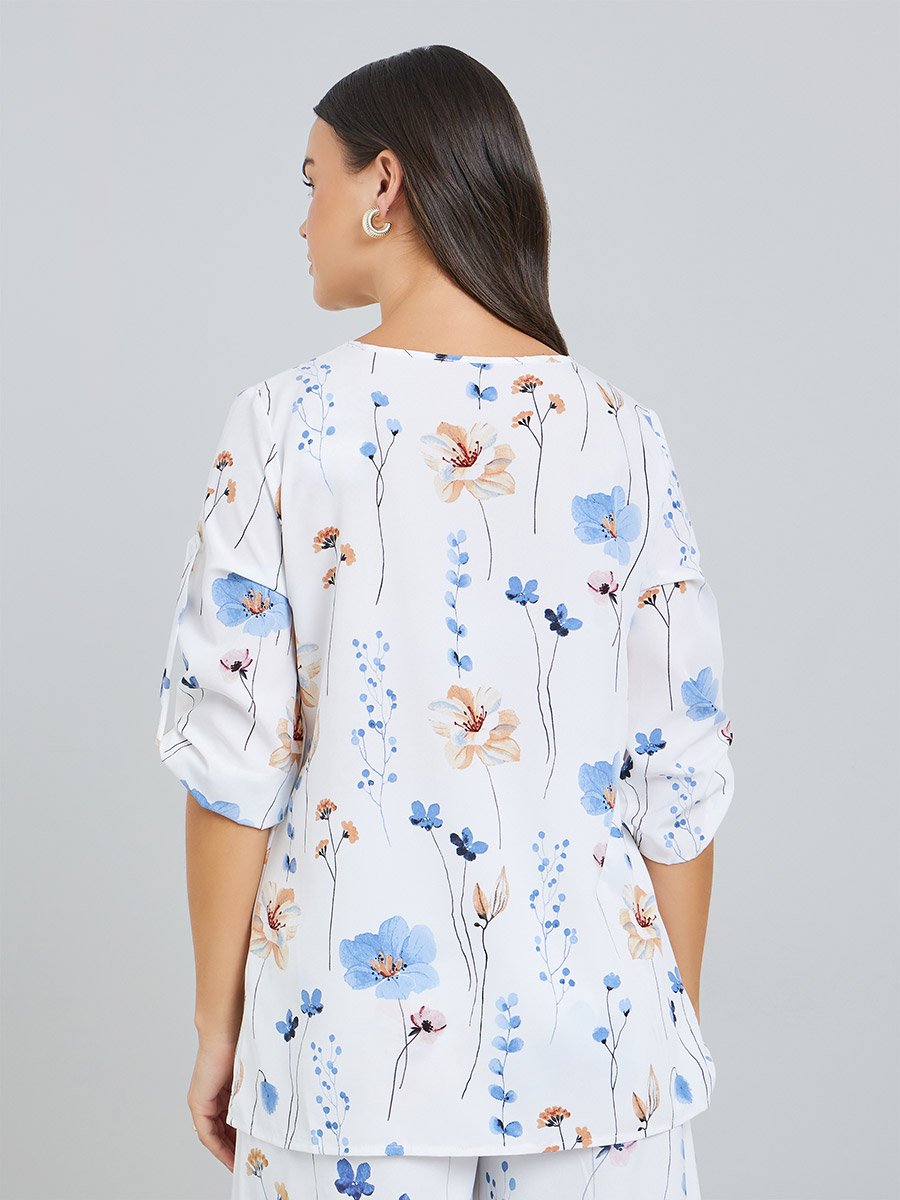 بلوزة نسائية بأكمام قابلة للطي وطبعة زهور