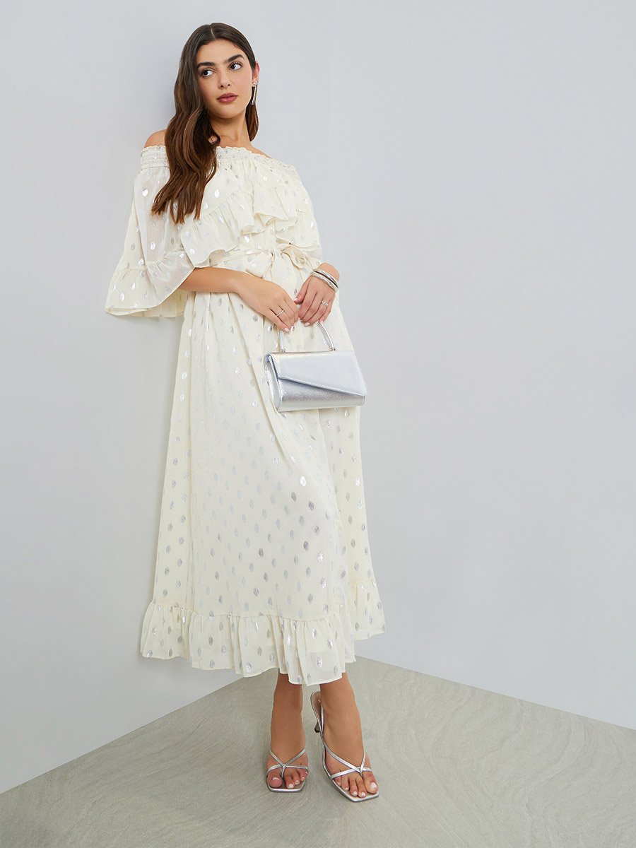 white dress shoulder off Bella and Bloom Boutique