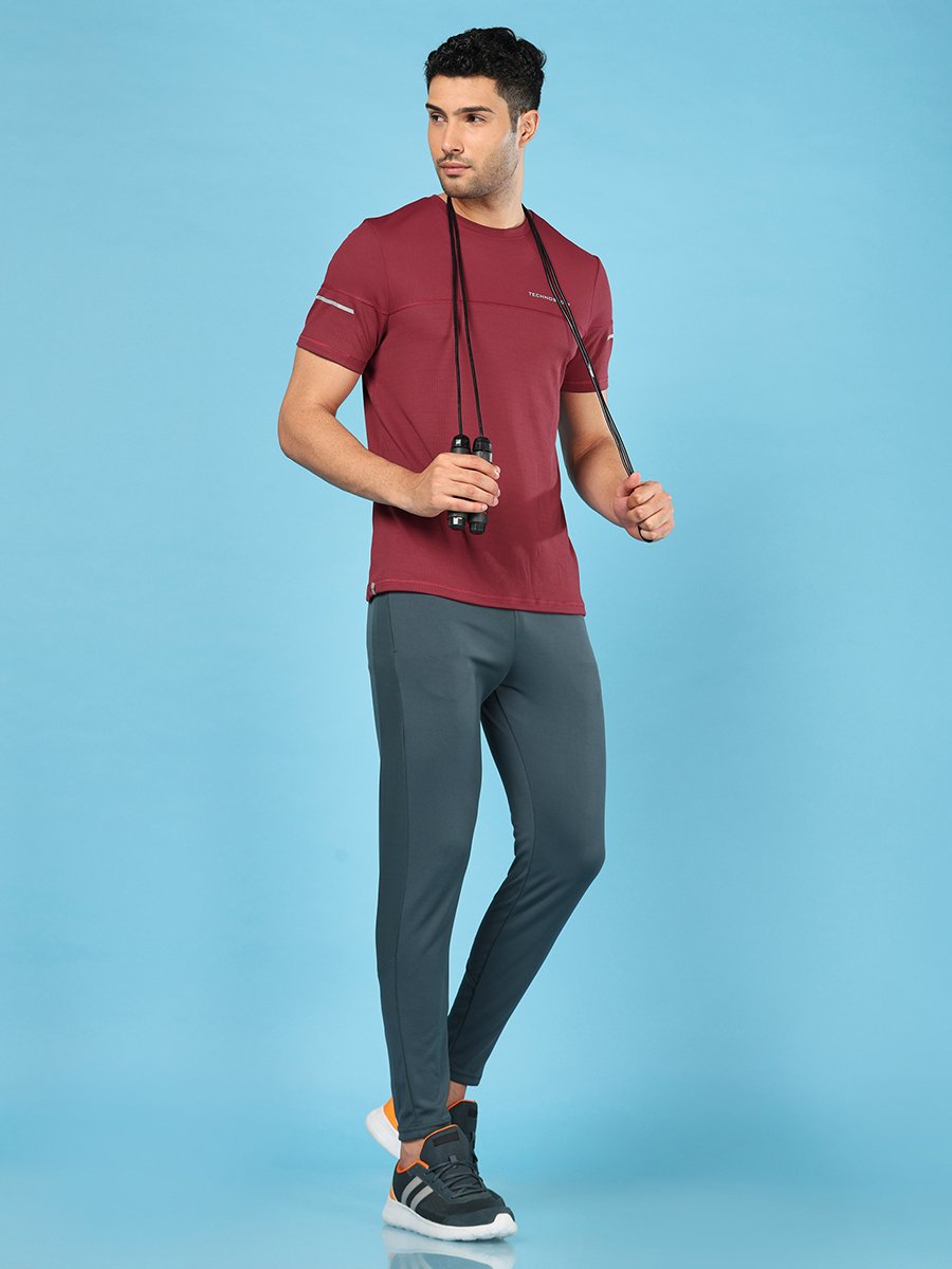 Men Solid Slim Fit Sports Track Pants with TECHNO DRY