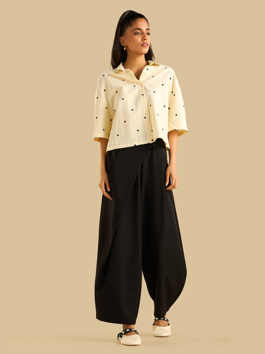 Mid Rise Wide Leg Pants with Pintuck Detail For Women at Oman | Styli