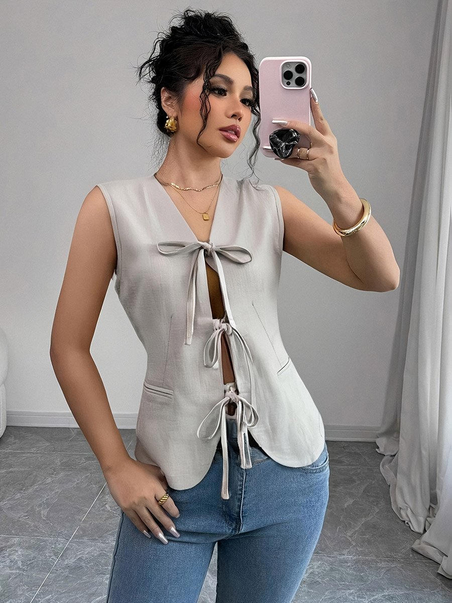 بلوزة سادة بلا أكمام وربطة أمامية