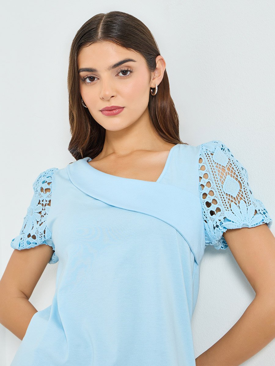Blue Solid Asymmetric Neck Hollow Puff Sleeve Top
