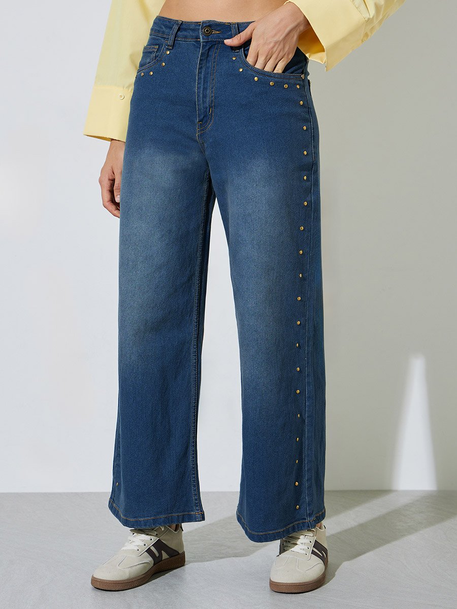 Dark Blue Wide Leg Jeans with Washed Effect and Brass Studded Seams