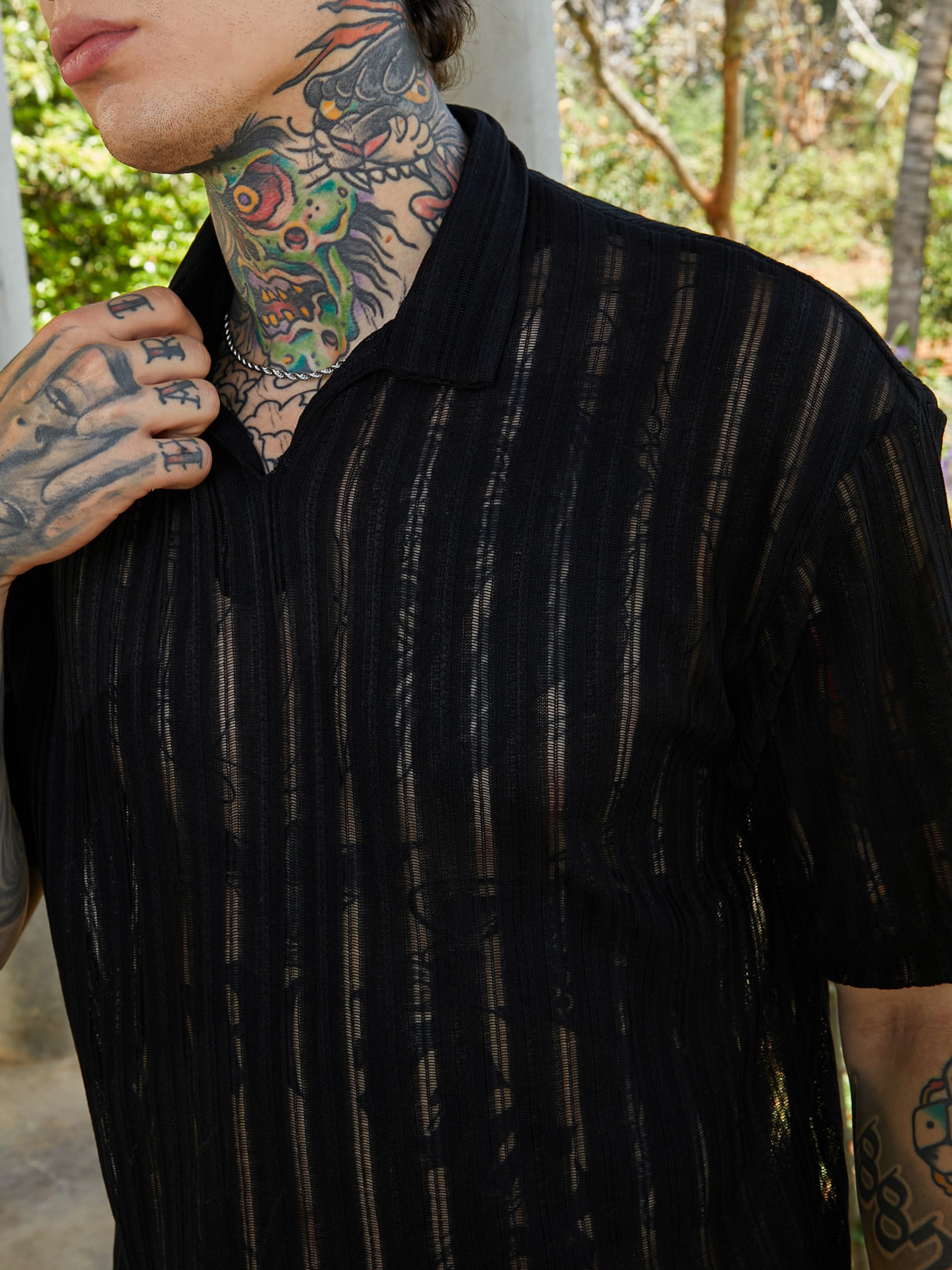 Men Black Striped Relaxed Polo