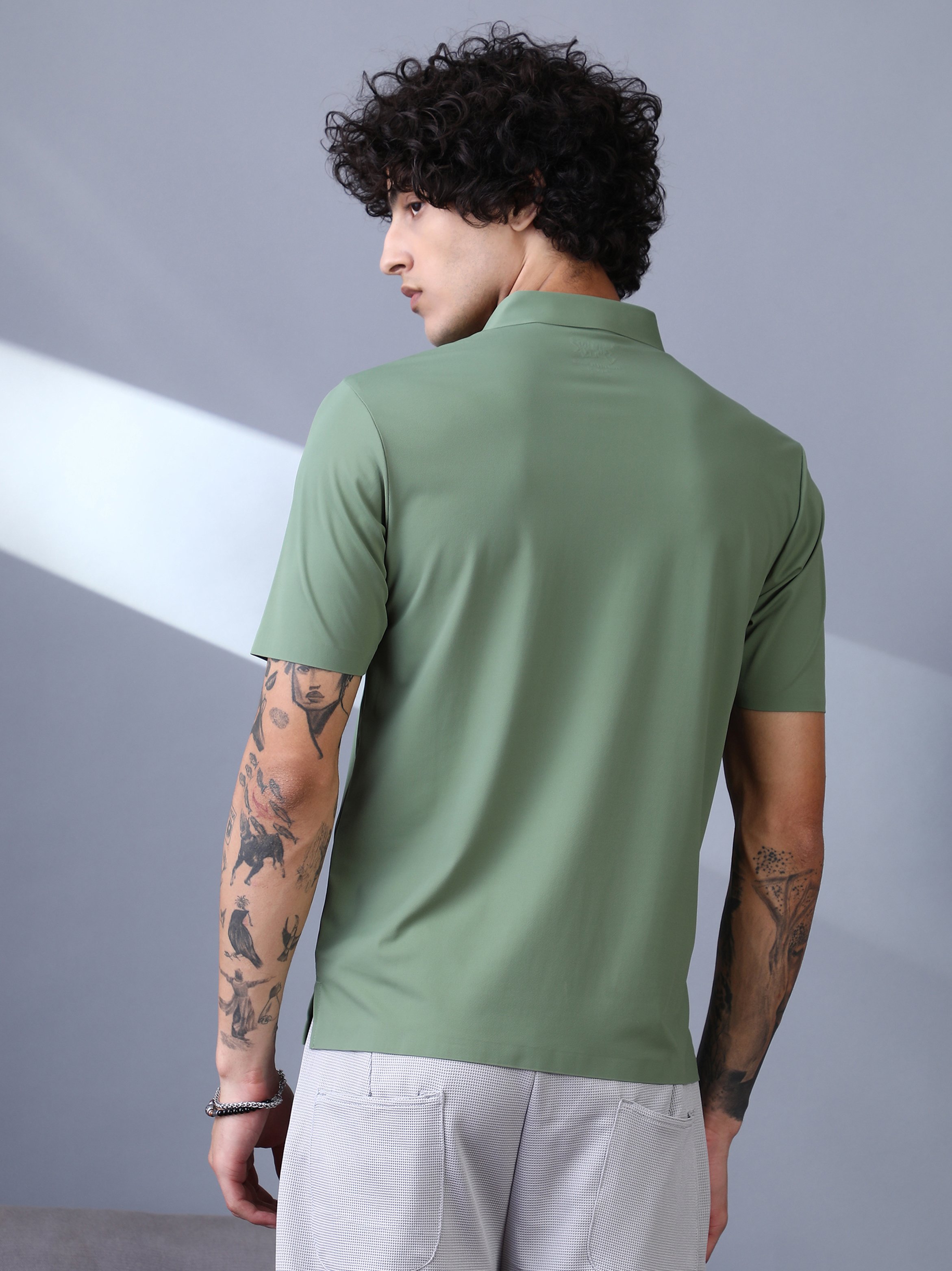 Men Green Seamless Solid Polo T-Shirt