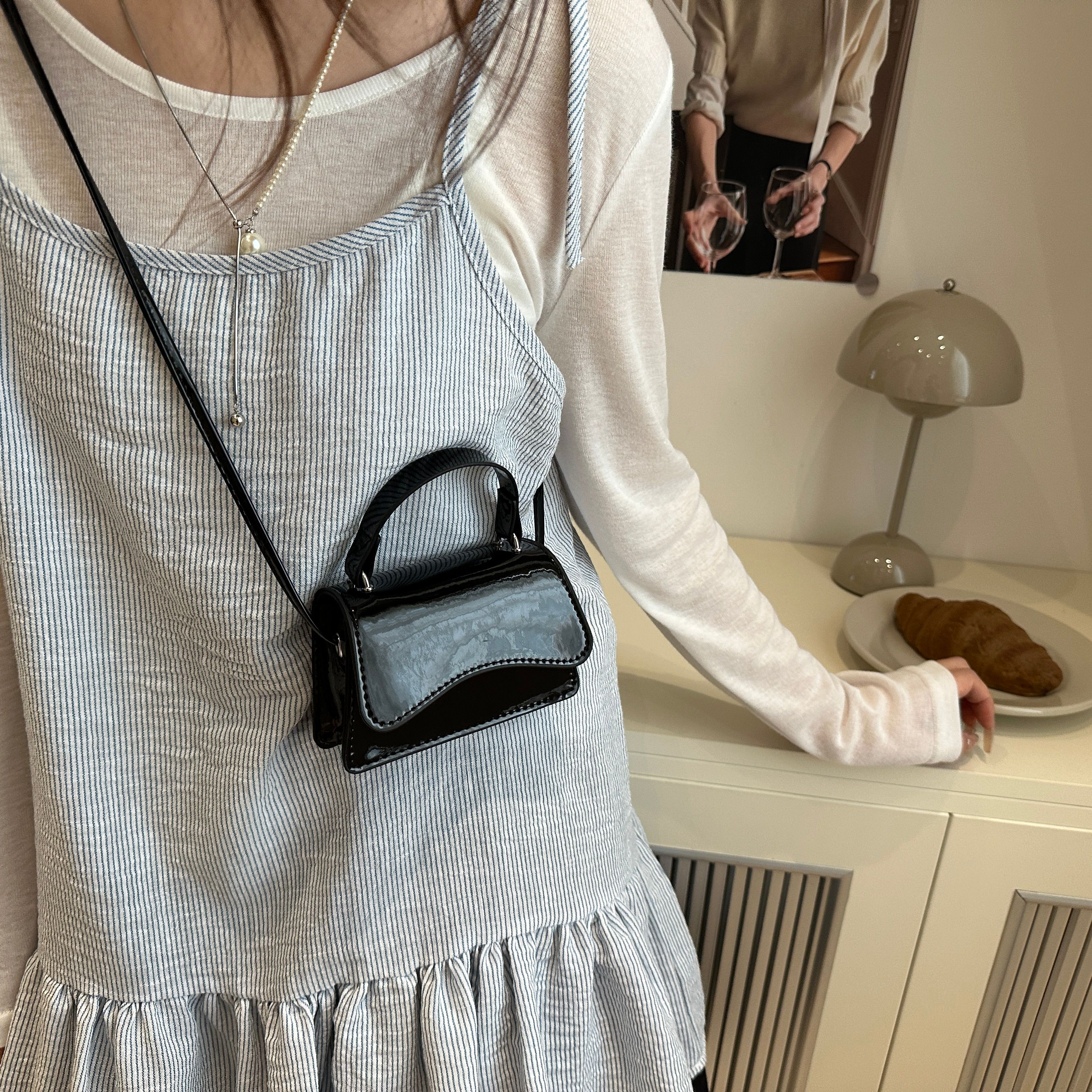 Black Shoulder Bag with Button Closure