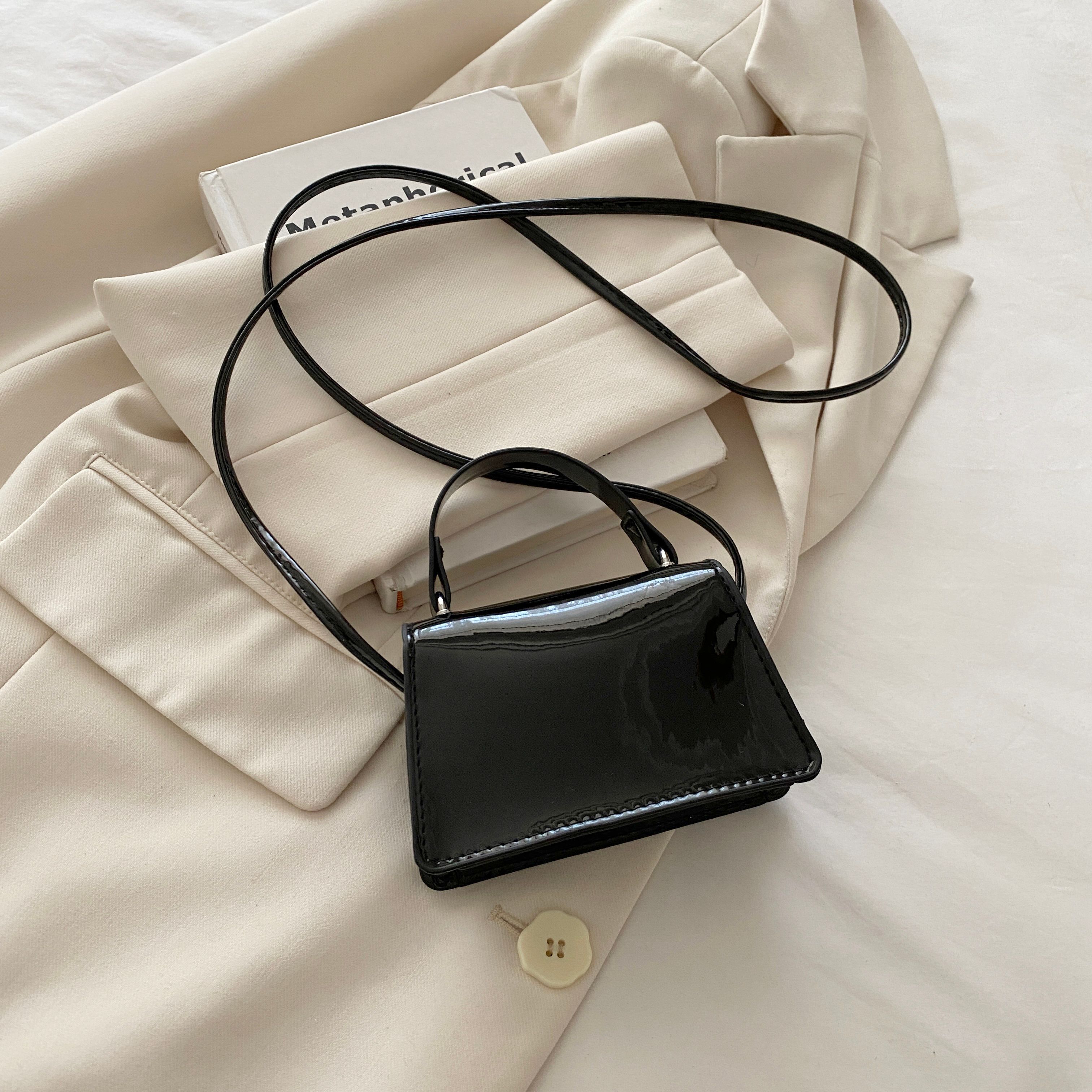 Black Shoulder Bag with Button Closure