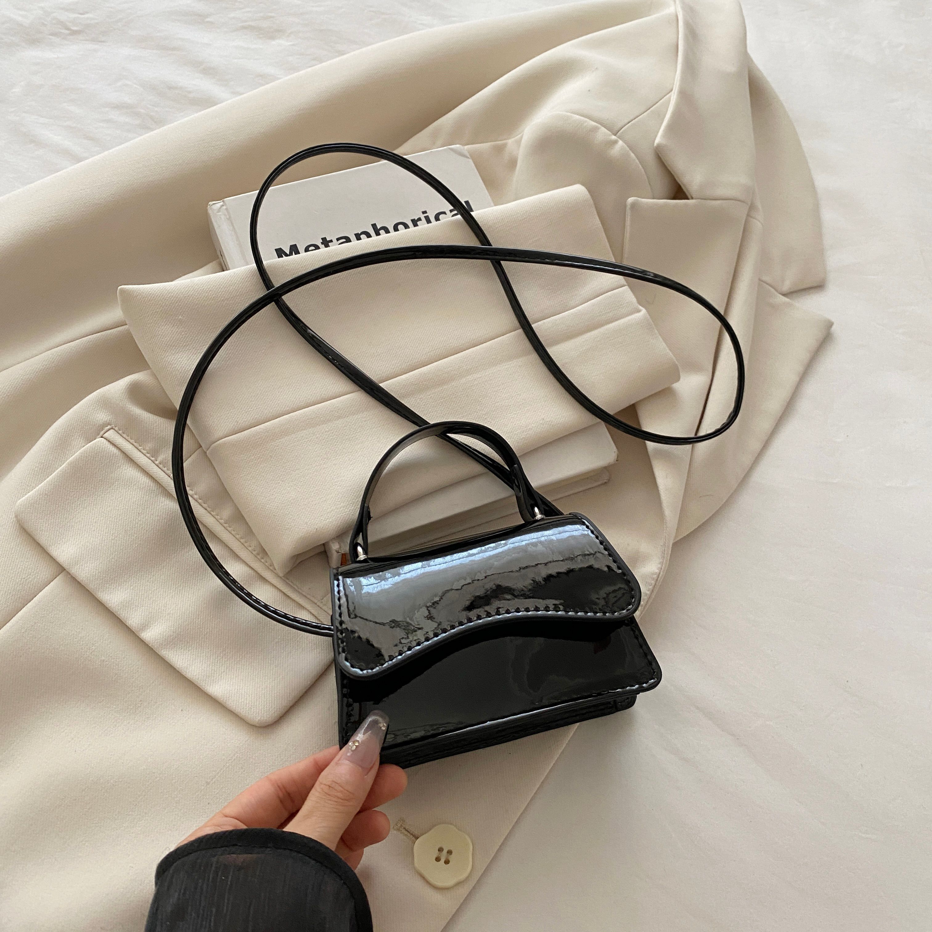 Black Shoulder Bag with Button Closure