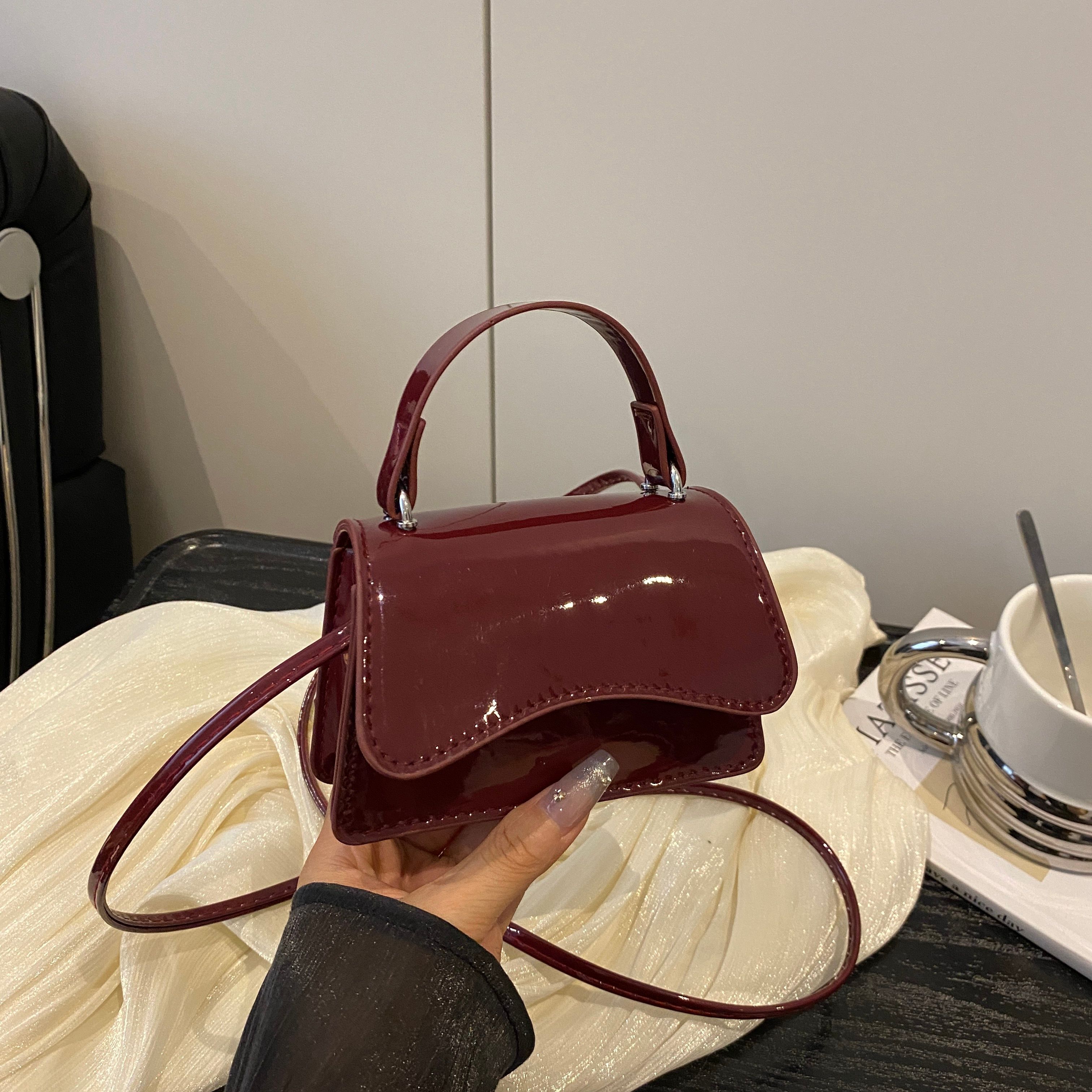 Red Shoulder Bag with Button Closure