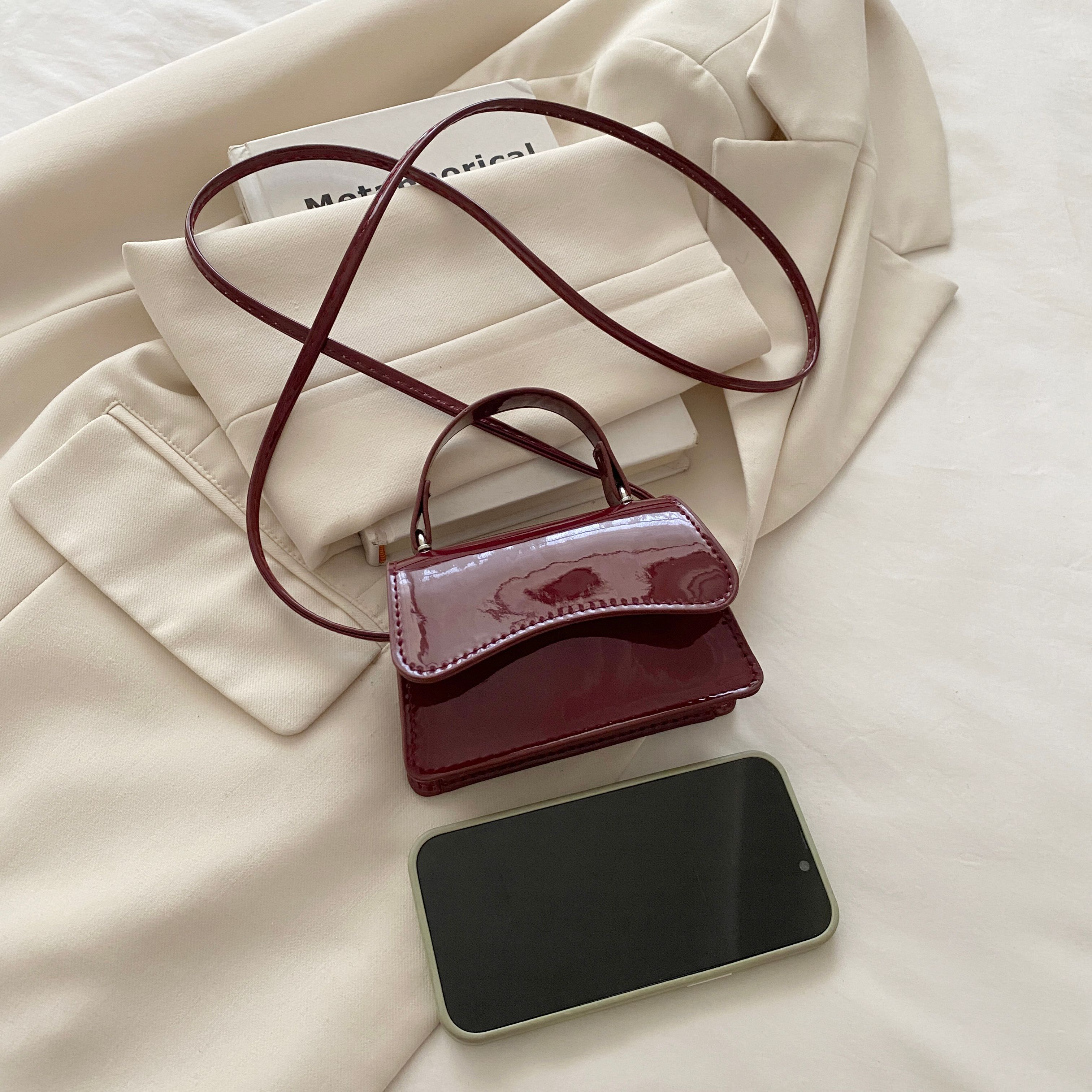 Red Shoulder Bag with Button Closure