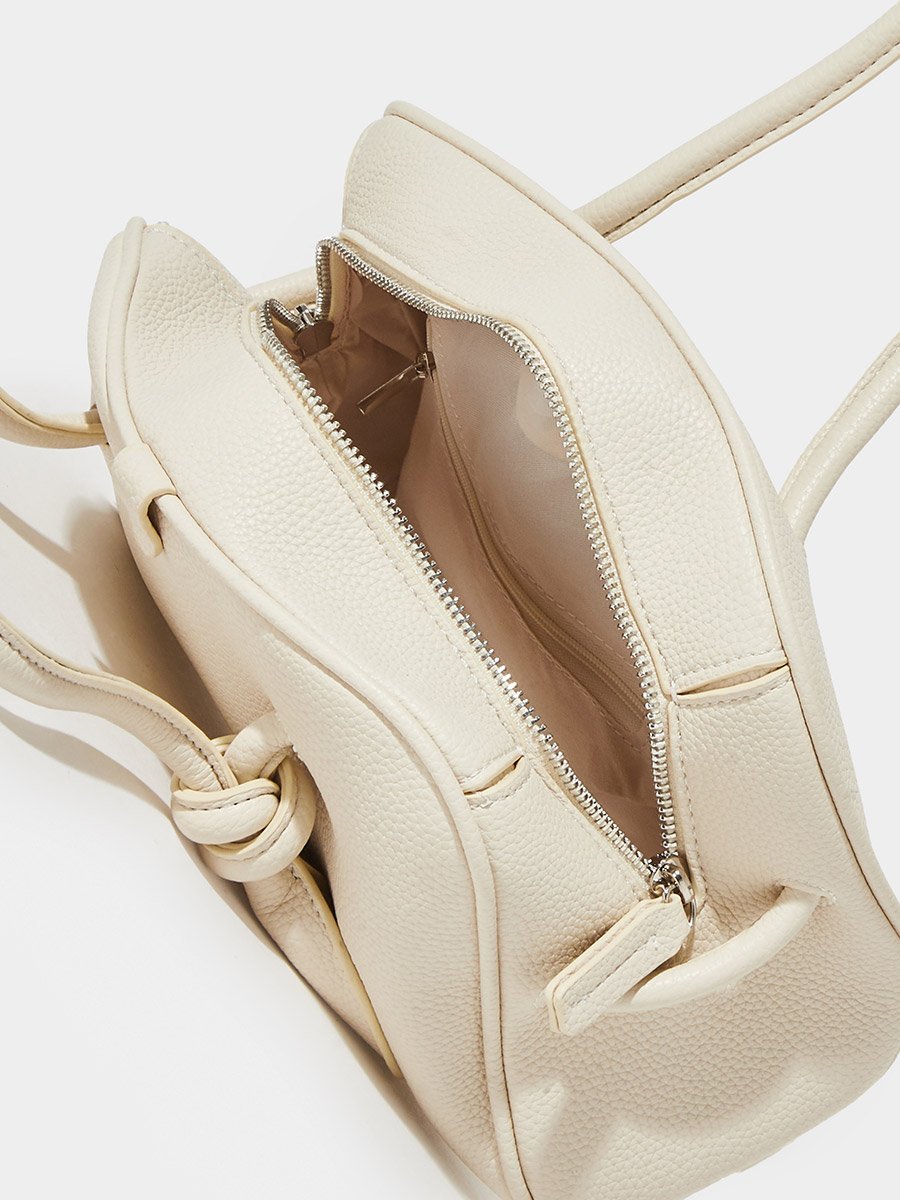 Off White Textured Knot Detail Handbag