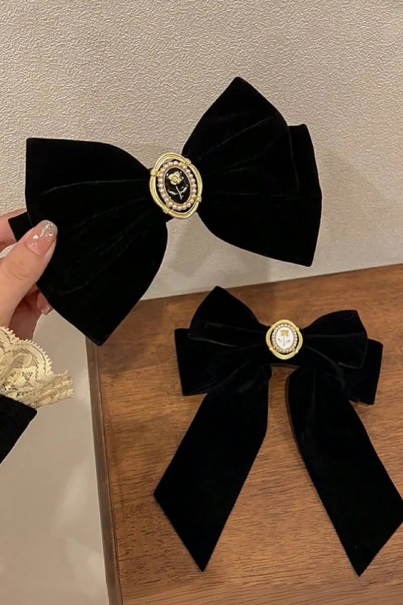 مجموعة من 2 مشبك شعر بفيونكة سوداء