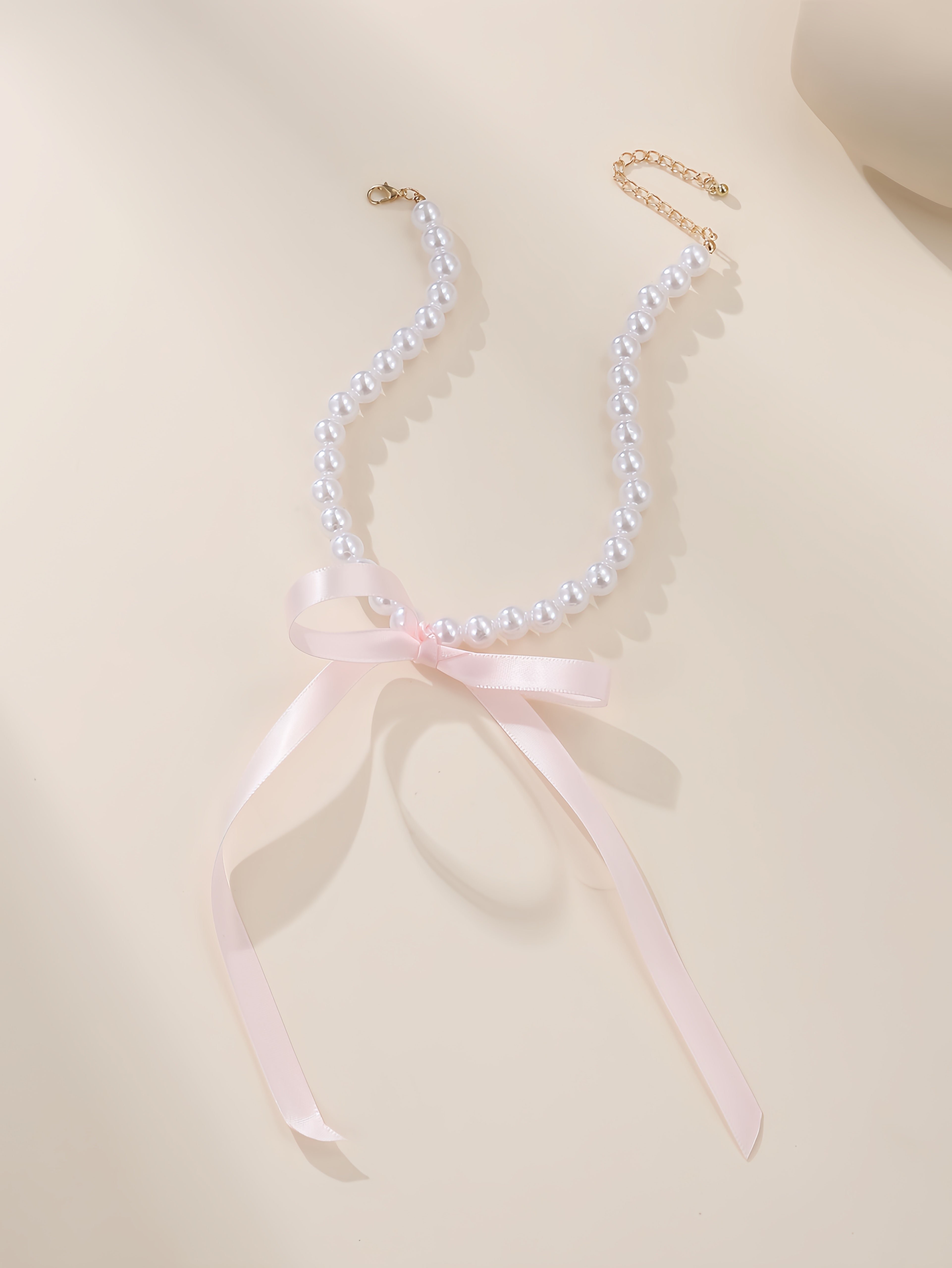 Pearl Beaded Necklace with Pink Ribbon