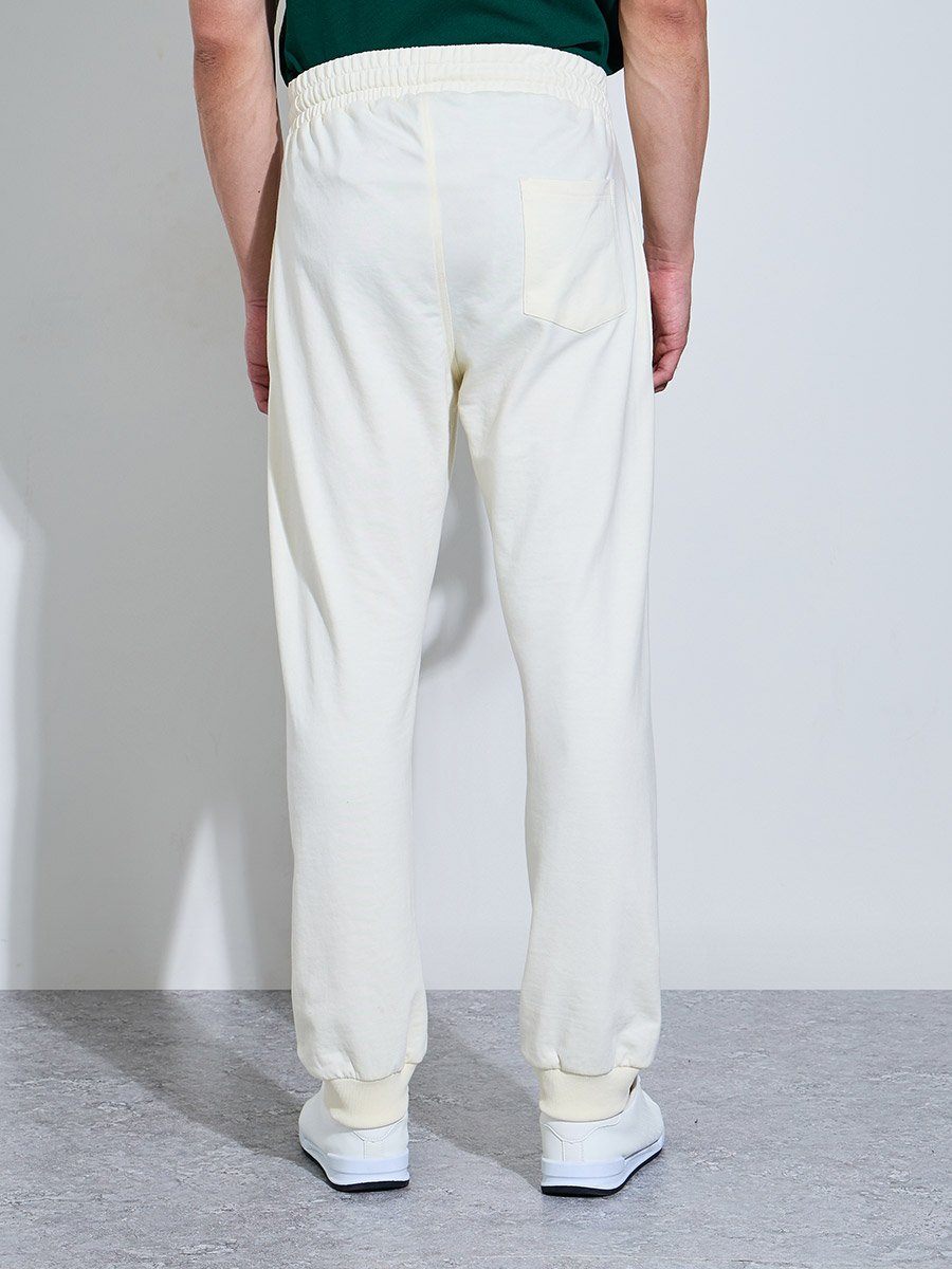 Men Cream Solid Slim Fit Cuffed Joggers