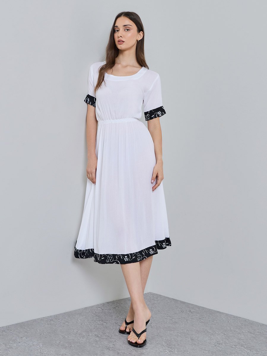White Solid Round Neck Fit and Flare Knee length Dress